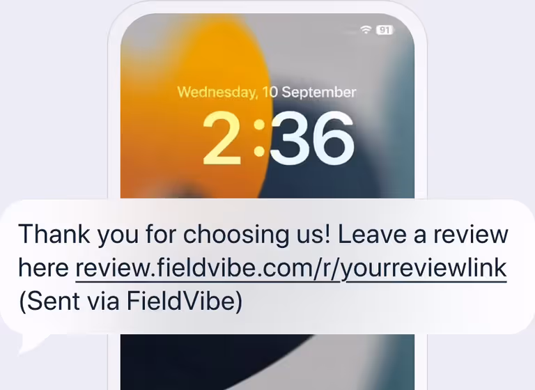 Review request text with a review link on a phone lock screen
