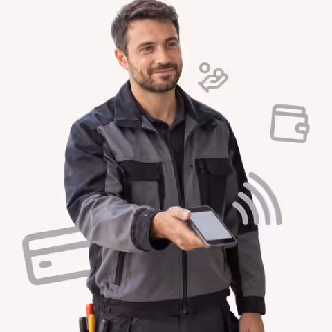 Technician holding out a phone for a contactless payment, with card and wallet icons