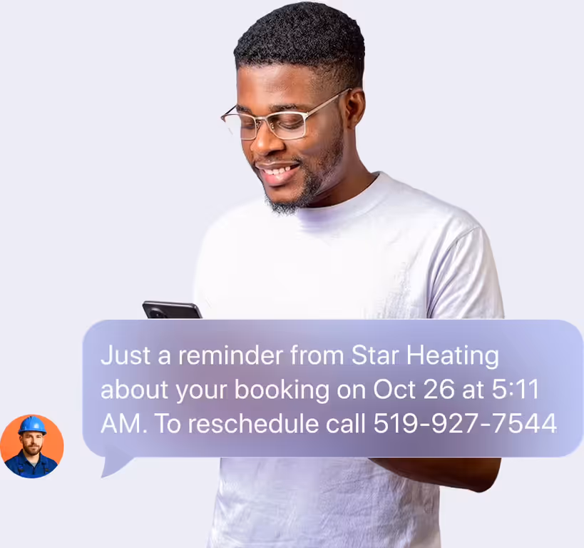 Client reading a FieldVibe appointment reminder text on his phone