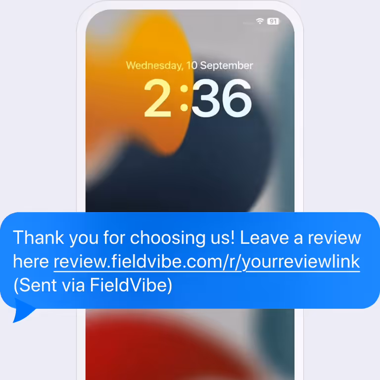 Review request text message with a review link on a phone lock screen